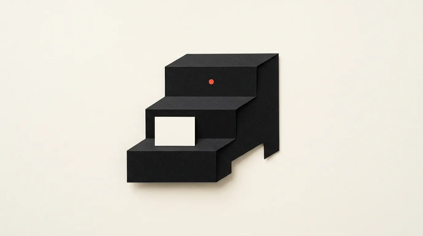 Cut-paper illustration: a low paper step stool with a small blank card on the first step, in black and off-white with one red-orange accent