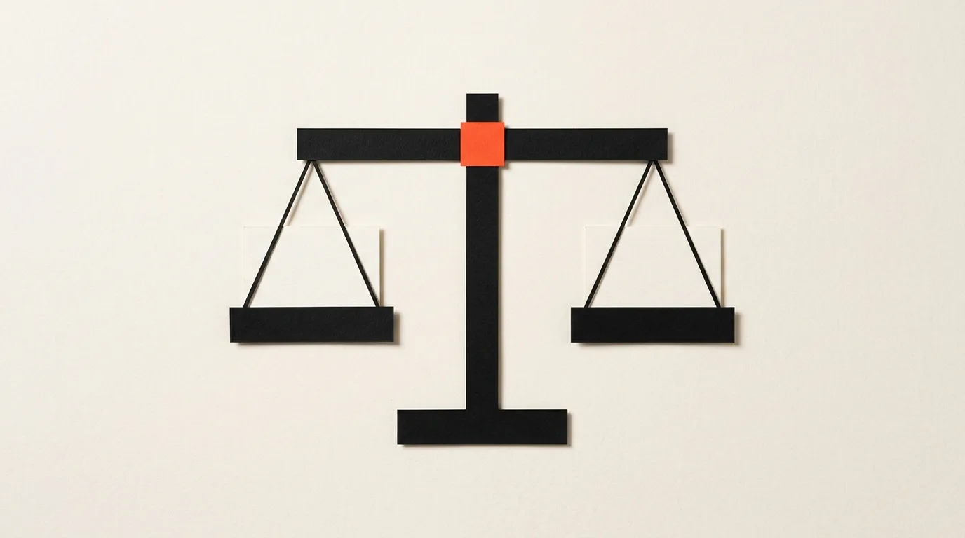 Cut-paper illustration: a paper balance scale shape with two small blank cards on its pans, in black and off-white with one red-orange accent