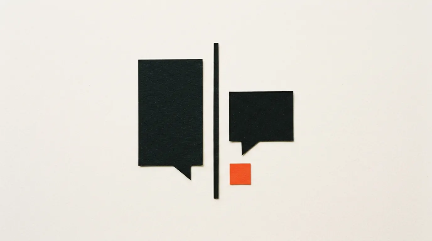 Cut-paper illustration: two plain paper speech bubbles of different heights either side of a thin divider, in black and off-white with one red-orange accent